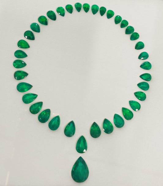 Emilio Jewelry Certified 98.00 Carat Emerald Necklace Layout