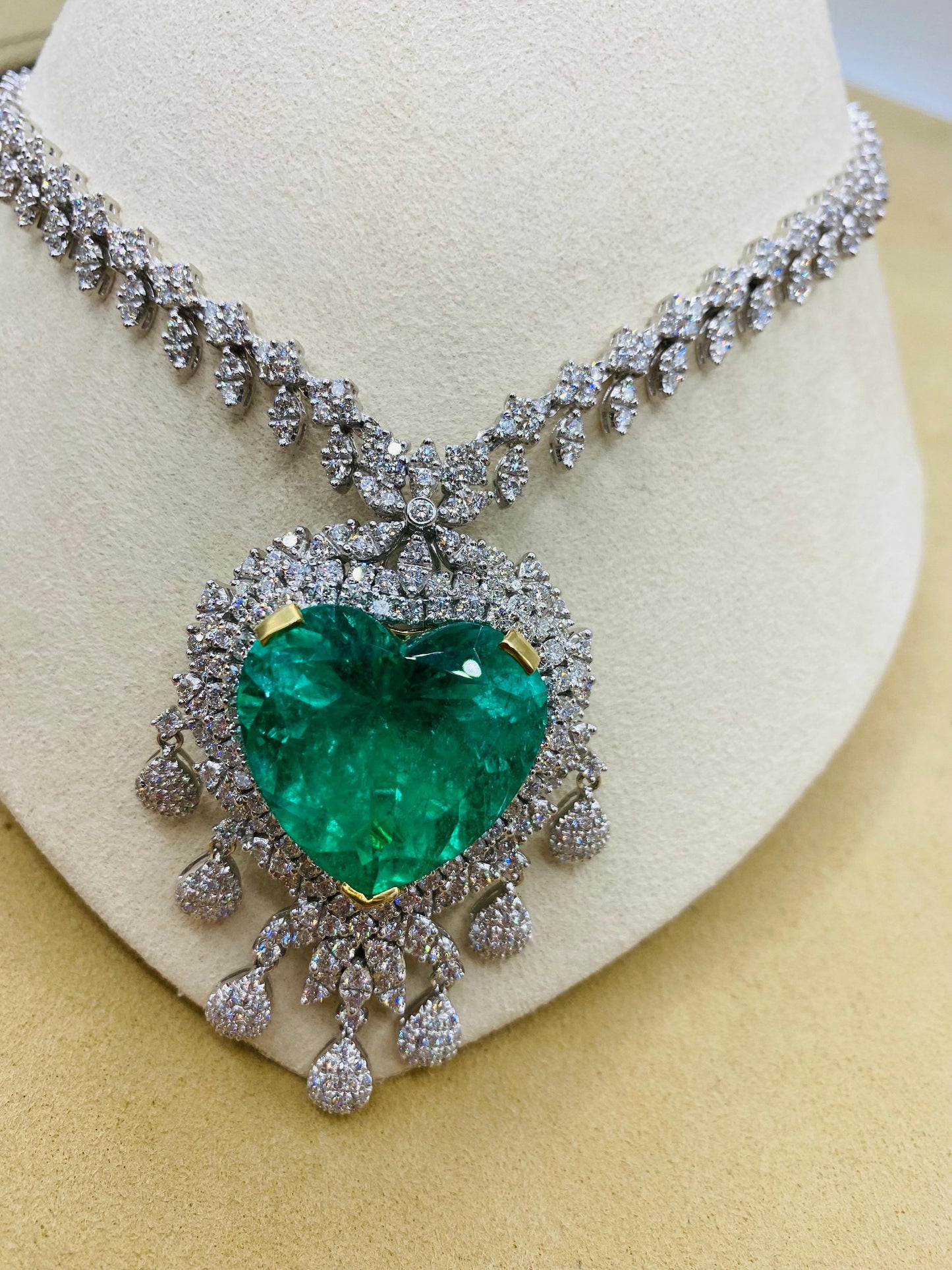 Emilio Jewelry Certified 54 Carat Vivid Green Colombian Emerald Heart Necklace