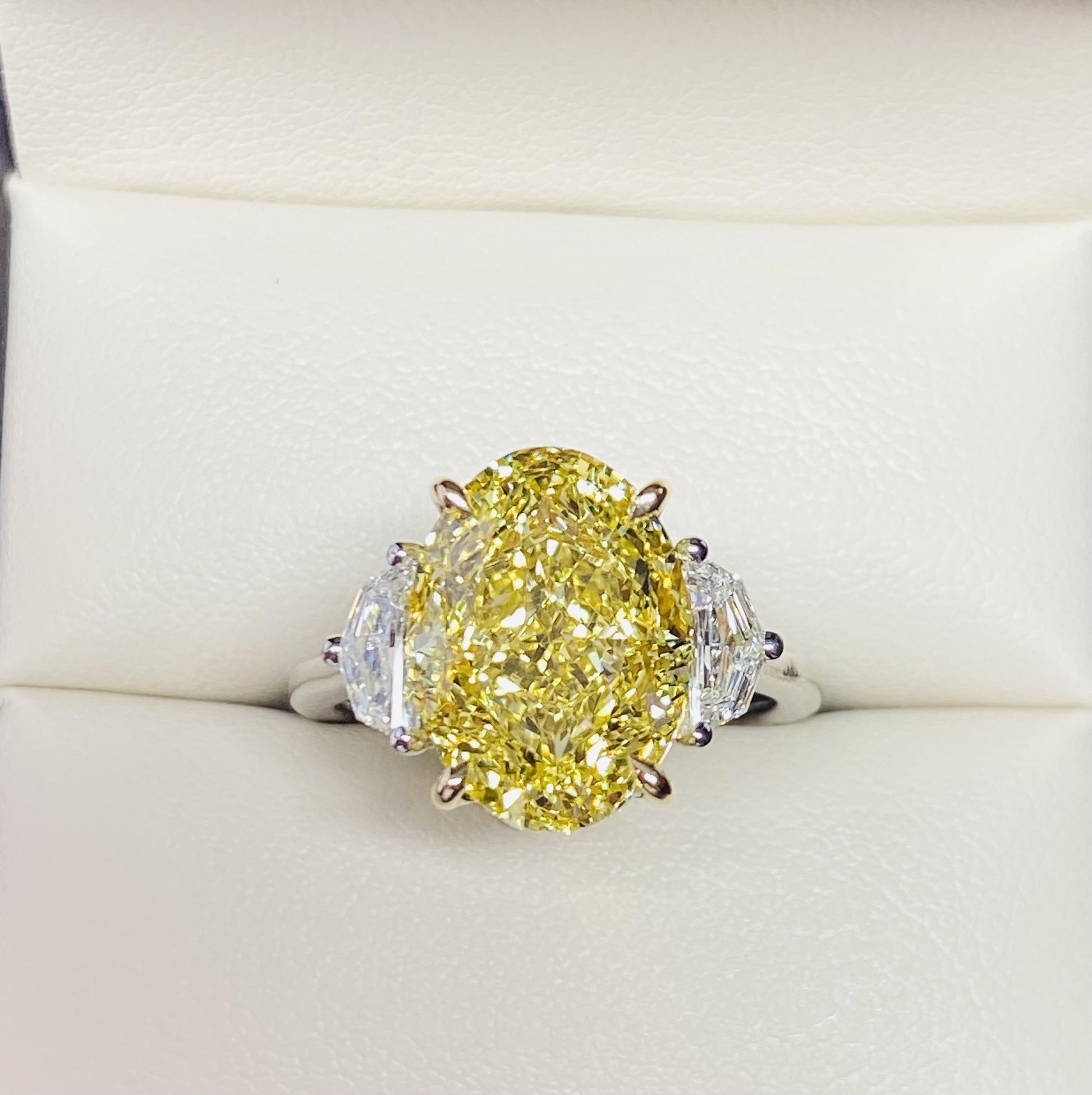 Emilio Jewelry GIA Certified 7.00 Carat Oval Fancy Intense Yellow Diamond Ring