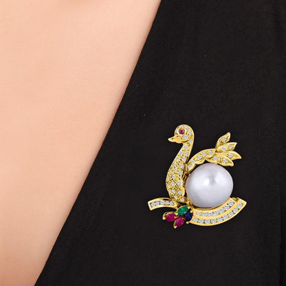 18 Karat Yellow Gold Diamond Swan Brooch with a South Sea Pearl Belly