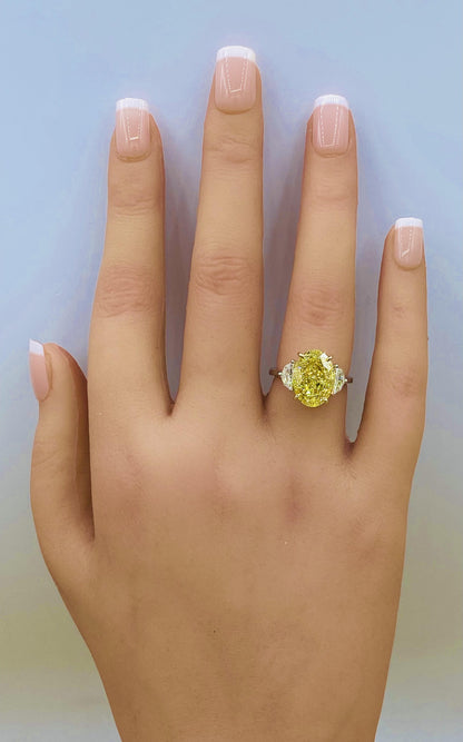 Emilio Jewelry GIA Certified 7.00 Carat Oval Fancy Intense Yellow Diamond Ring