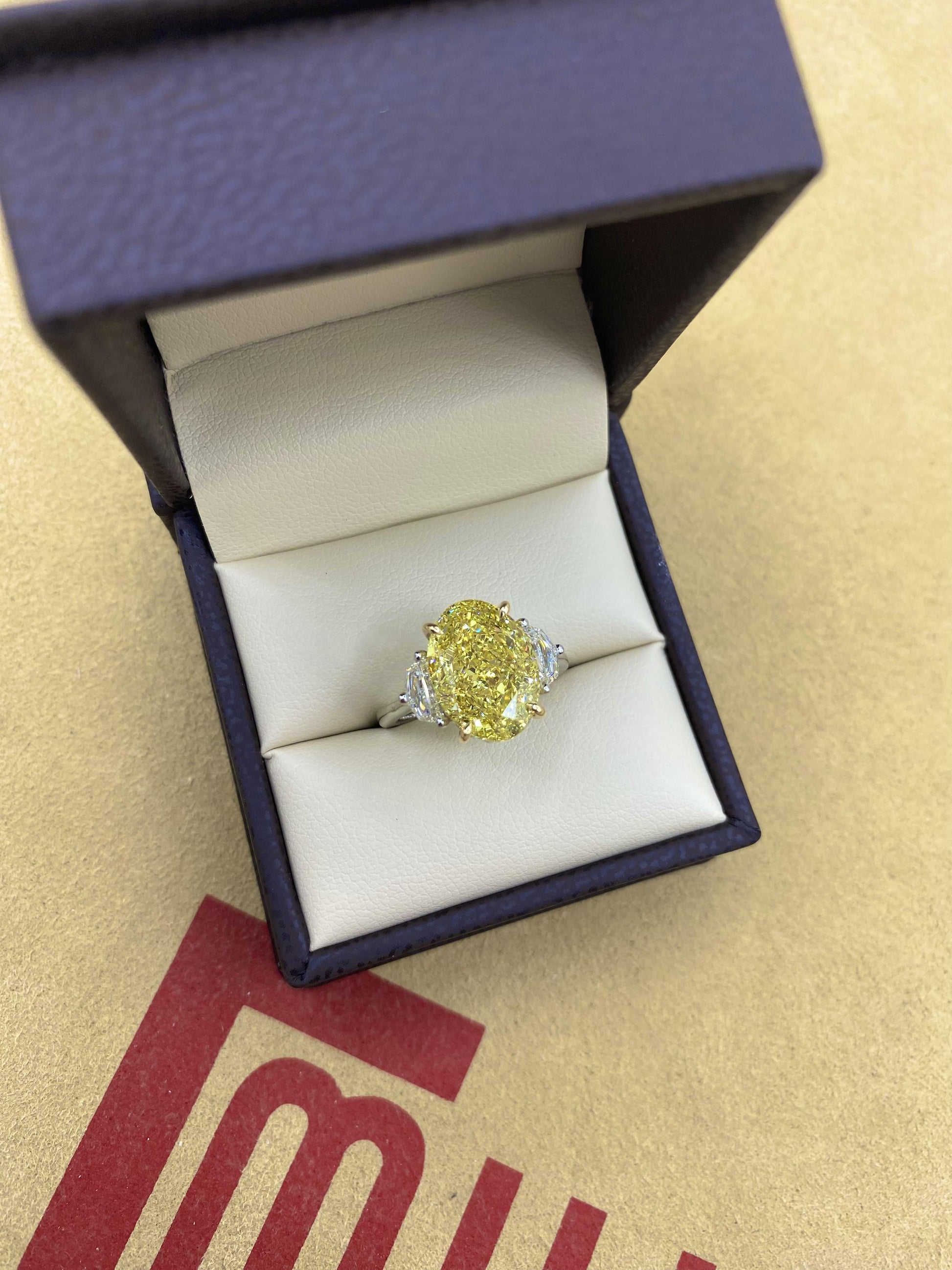 Emilio Jewelry GIA Certified 7.00 Carat Oval Fancy Intense Yellow Diamond Ring